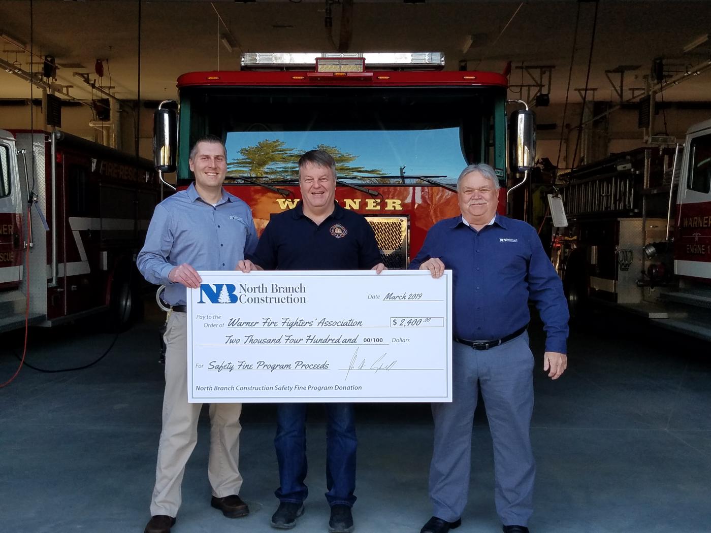 North Branch Construction Presents Safety Fine Program Proceeds at Recently-Completed Warner Fire Station